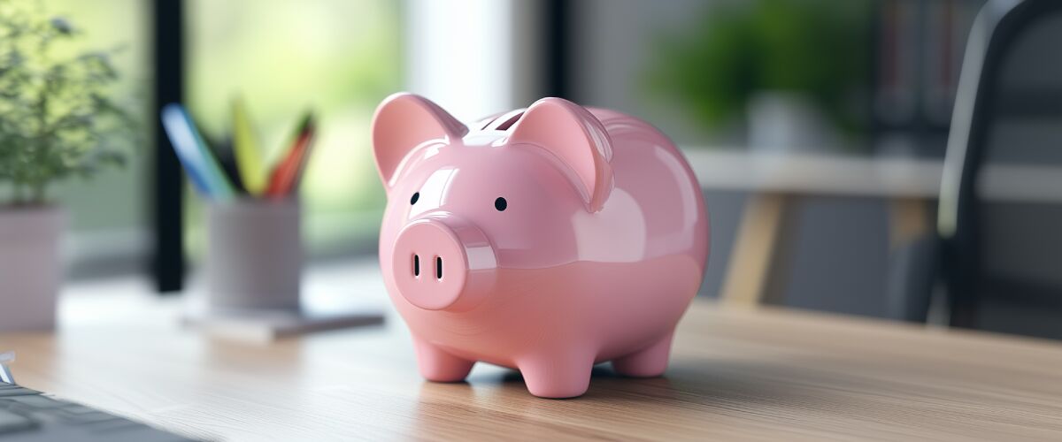 Concept art of an article about Starting a Business After Retirement: pink piggy bank on office desk (AI Art)
