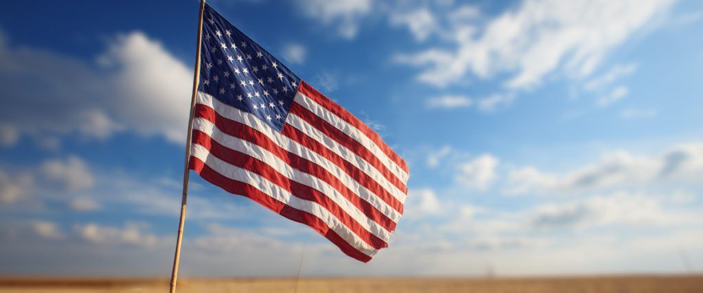 Here’s the AI description for the alt tag but it’s not the final name yet—please check the naming we usually do for images: US flag waving on a sunny day (AI)